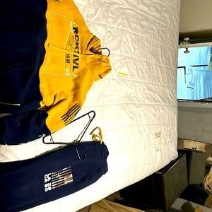 Size large Rock Revival sweat shirt and medium pants